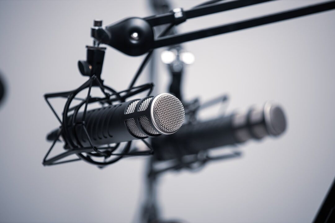 Podcast recording studio with two hosts and professional microphones
