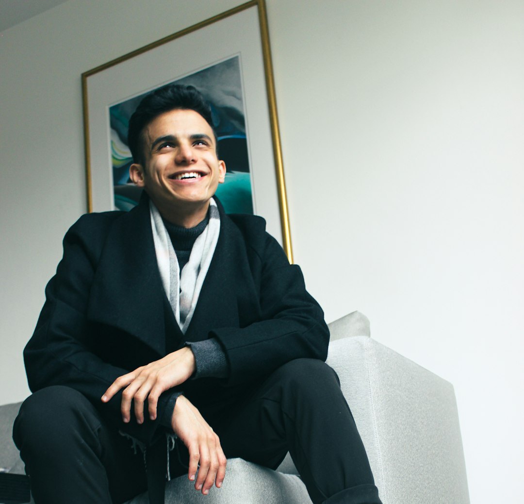 Professional businessman in suit smiling confidently