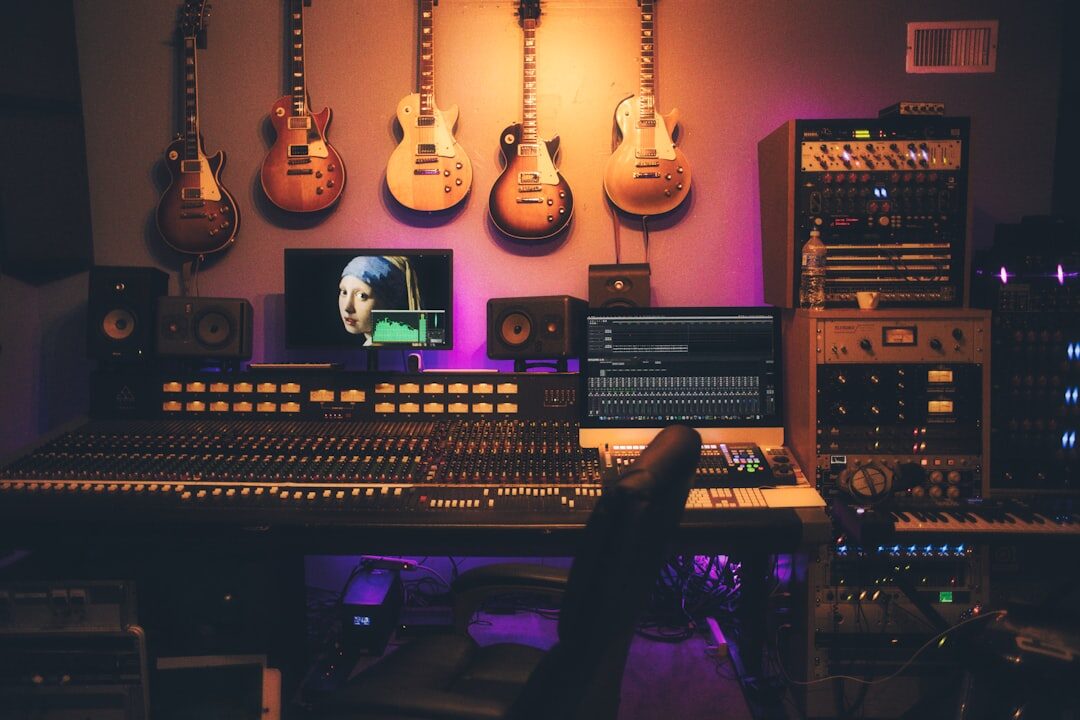 Modern recording studio with professional speakers and mixing equipment